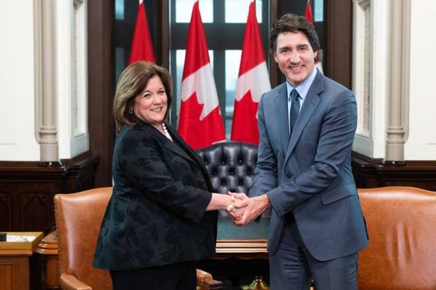 April 19, 2023, Ottawa, ON, Canada: U.S. Chamber of Commerce President and CEO, Suzanne P. Clark, meets with Prime Minister Justin Trudeau in his West Block office on Parliament Hill in Ottawa, on Wednesday, April 19, 2023. Ottawa Canada  - ZUMAc35_ 20230419_zaf_c35_118 Copyright: xSpencerxColbyx