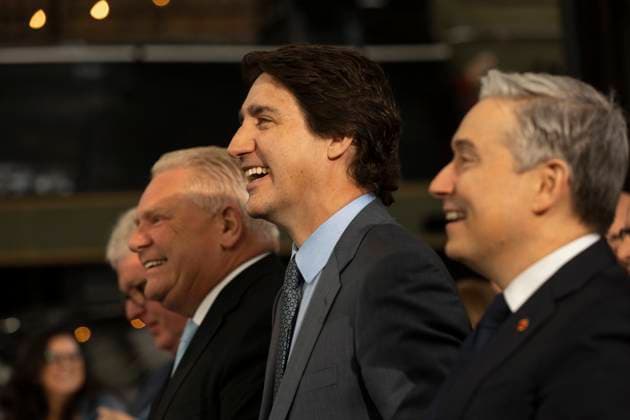 April 21, 2023, St. Thomas, ON, Canada: Prime Minister Justin Trudeau, Ontario Premier Doug Ford and Industry Minister Francois-Philippe Champagne attend an announcement on a Volkswagen electric vehicle battery plant at the Elgin County Railway Museum in St. Thomas, Ont. Friday, April 21, 2023. St. Thomas Canada  - ZUMAc35_ 20230421_zaf_c35_053 Copyright: xTaraxWaltonx