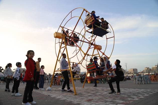 News Themen der Woche KW16 News Bilder des Tages April 22, 2023, Nusrat refugee cap, The Gaza Strip, Palestine: Palestinians celebrate Eid al-Fitr in Nusrat refugee camp in the central of the Gaza Strip. Nusrat refugee cap Palestine - ZUMAq100 20230422_zaa_q100_002 Copyright: xDoaaxAlbazx