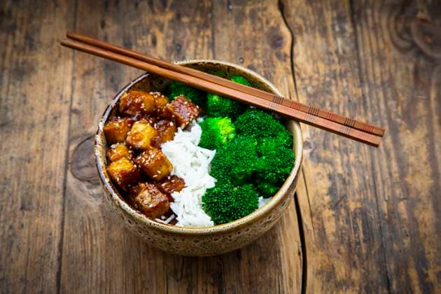 Bowl of coconut rice with tofu, broccoli and sesame seeds, LVF09322