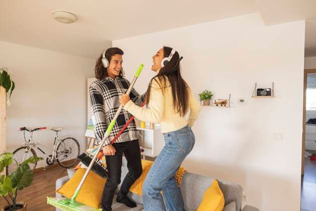 Happy couple having fun doing housework model released, Symbolfoto property released, JCCMF10204