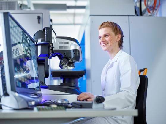 Happy scientist using desktop PC at E-Laboratory model released, Symbolfoto property released, CVF02374