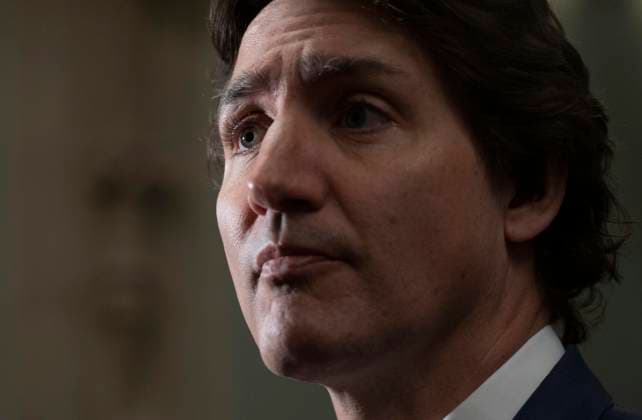 April 25, 2023, Ottawa, ON, Canada: Prime Minister Justin Trudeau listens to a question as he speaks with reporters before a meeting of the cabinet on Parliament Hill, Tuesday, April 25, 2023 in Ottawa. Ottawa Canada  - ZUMAc35_ 20230425_zaf_c35_020 Copyright: xAdrianxWyldx