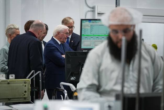 April 25, 2023, BURNABY, BC, CANADA: Germany President Frank-Walter Steinmeier, back right, listens during a tour of fuel cell stack manufacturer, Cellcentric Canada, in Burnaby, B.C., Tuesday, April 25, 2023. BURNABY CANADA - ZUMAc35_ 20230425_zaf_c35_059 Copyright: xDarrylxDyckx