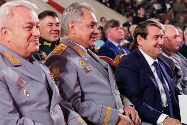 RUSSIA, MOSCOW - APRIL 29, 2023: Russia s Deputy Defence Minister Nikolai Pankov, Defence Minister Sergei Shoigu and President Putin s adviers Igor Levitin (from L to R) attend a concert marking the centenary of the CSKA sports club at the Central Academic Theatre of the Russian Army. Vadim Savitsky Russian Defence Ministry Press Office TASS  58742979