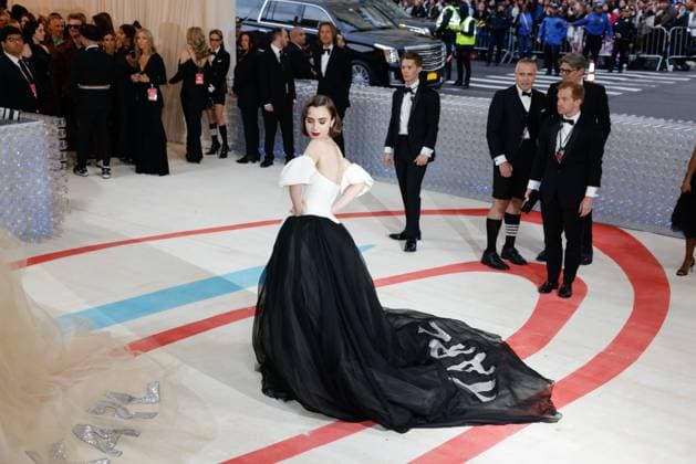 Lily Collins arrives on the red carpet for The Met Gala at The Metropolitan Museum of Art celebrating the opening of Karl Lagerfeld: A Line of Beauty in New York City on Monday, May 1, 2023.  NYP20230501205 JOHNxANGELILLO