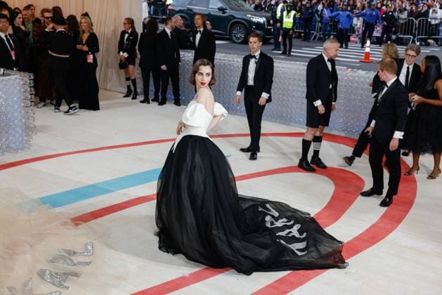 Lily Collins arrives on the red carpet for The Met Gala at The Metropolitan Museum of Art celebrating the opening of Karl Lagerfeld: A Line of Beauty in New York City on Monday, May 1, 2023.  NYP20230501206 JOHNxANGELILLO
