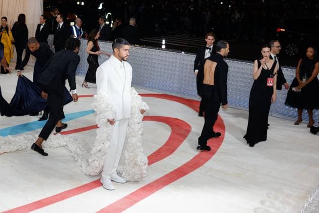 Bad Bunny arrives on the red carpet for The Met Gala at The Metropolitan Museum of Art celebrating the opening of Karl Lagerfeld: A Line of Beauty in New York City on Monday, May 1, 2023.  NYP20230501294 JOHNxANGELILLO