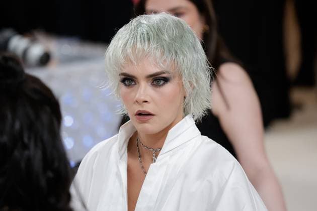 Cara Delevingne arrives on the red carpet for The Met Gala at The Metropolitan Museum of Art celebrating the opening of Karl Lagerfeld: A Line of Beauty in New York City on Monday, May 1, 2023.  NYP202305015163 JOHNxANGELILLO