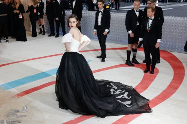 Lily Collins arrives on the red carpet for The Met Gala at The Metropolitan Museum of Art celebrating the opening of Karl Lagerfeld: A Line of Beauty in New York City on Monday, May 1, 2023.  NYP202305015075 JOHNxANGELILLO