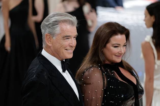 Pierce Brosnan and Keely Shaye Smith arrive on the red carpet for The Met Gala at The Metropolitan Museum of Art celebrating the opening of Karl Lagerfeld: A Line of Beauty in New York City on Monday, May 1, 2023.  NYP2023050190004 JOHNxANGELILLO