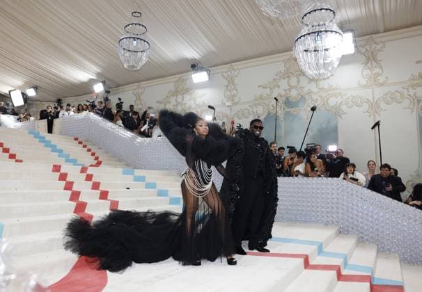 Yung Miami and Sean Combs exit from the red carpet at The Met Gala at The Metropolitan Museum of Art celebrating the opening of Karl Lagerfeld: A Line of Beauty in New York City on Monday, May 1, 2023.  NYP20230501116 JOHNxANGELILLO