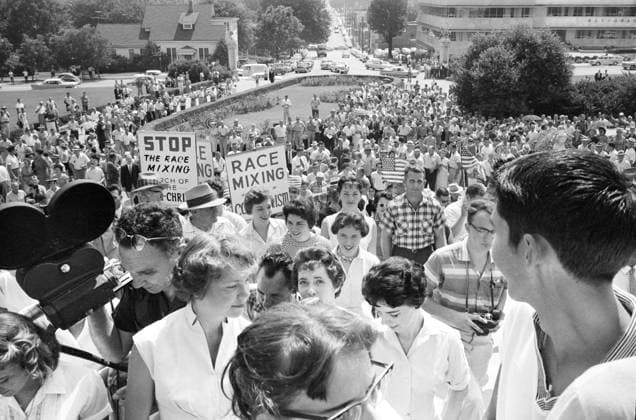 Crowd at Arkansas State Capitol protesting integration of Central High School, with signs reading Race mixing is Communism and Stop the race mixing, Little Rock, Arkansas, USA, John T. Bledsoe, U.S. News & World Report Magazine Photograph Collection, August 20, 1959  Copyright: xCircaxImagesx ghi-circa11610