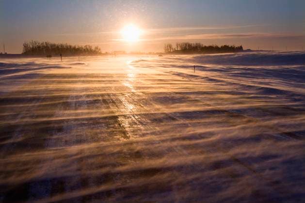 Ice covered road with sun rising in distance. Copyright: xIofotoxImagesx xDesignxPicsx , 30751736 Copyright: IofotoxImagesx xDesignxPics 30751736