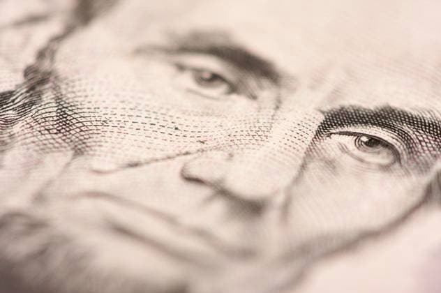 Abstract Macro of U.S. Five Dollar Bill s Abraham Lincoln face with Narrow Depth of Field. Copyright: xAndyxDeanx xDesignxPicsx , 30845274 Copyright: AndyxDeanx xDesignxPics 30845274