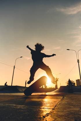 Skateboarder in action. Boy making skate air trick with grab Lima, Callao Region, Peru CR_DOQO230503CE-1179362-01