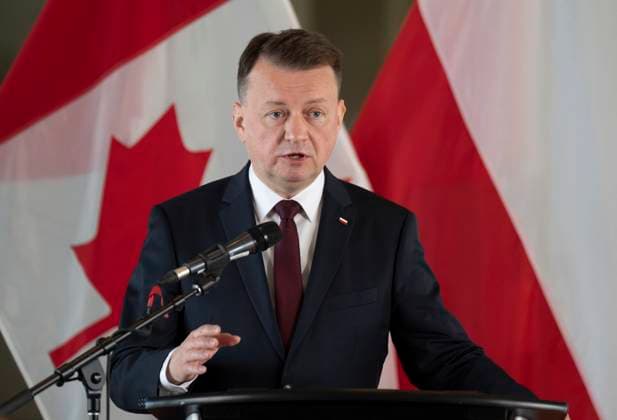 May 8, 2023, Ottawa, ON, Canada: Polish Deputy Prime Minister and Minister of National Defence Mariusz BAöaszczak responds to a question during a joint news conference with CanadaÃ¢â‚¬â ¢s Minister of Defence Anita Anand at National Defence Headquarters, in Ottawa, Monday, May 8, 2023. Ottawa Canada  - ZUMAc35_ 20230508_zaf_c35_021 Copyright: xAdrianxWyldx