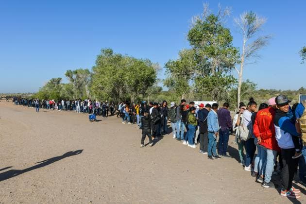 YUMA, AZ - MAY 11: Migrants seen set to cross the border at Cocopah Indian Reservation before Title 42 is set to end at 11:59pm allowing all migrants to apply for asylum after the three-year COVID-era health ban. Yuma, Arizona on May 11, 2023. Copyright: xDeeCeexCarterx