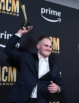 Zach Bryan shows off his New Male Artist of the Year Award at the 2023 Academy of Country Music Awards at The Star in Frisco, TX on Thursday, May 11, 2023.  FRS2023051154 IANxHALPERIN
