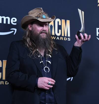 Chris Stapleton shows off his Entertainer of the Yerar award at the 2023 Academy of Country Music Awards at The Star in Frisco, TX on Thursday, May 11, 2023.  FRS2023051156 IANxHALPERIN