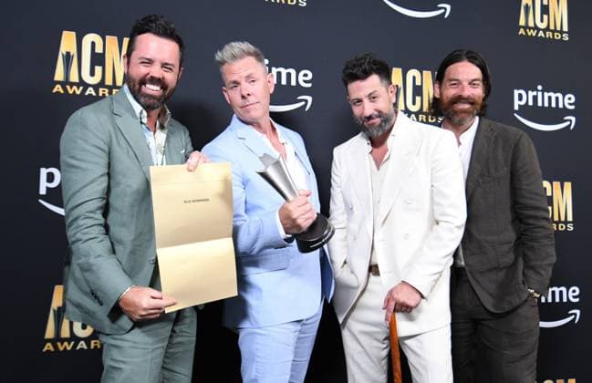 Old Dominion shows off their Group of the Year Award at the 2023 Academy of Country Music Awards at The Star in Frisco, TX on Thursday, May 11, 2023.  FRS2023051159 IANxHALPERIN