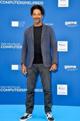 Tyron Ricketts bei der Verleihung des Deutschen Computerspielpreises 2023 im Spindler & Klatt. Berlin, 11.05.2023