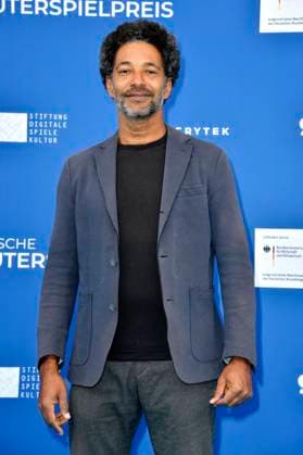 Tyron Ricketts bei der Verleihung des Deutschen Computerspielpreises 2023 im Spindler & Klatt. Berlin, 11.05.2023