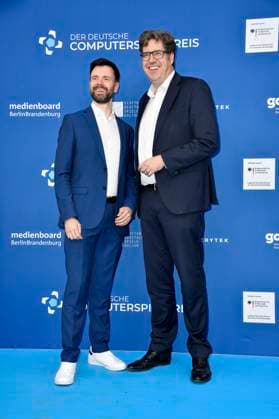 Felix Falk und Michael Kellner bei der Verleihung des Deutschen Computerspielpreises 2023 im Spindler & Klatt. Berlin, 11.05.2023