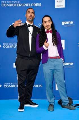 Patrice Bouedibela und Masud Akbarzadeh bei der Verleihung des Deutschen Computerspielpreises 2023 im Spindler & Klatt. Berlin, 11.05.2023