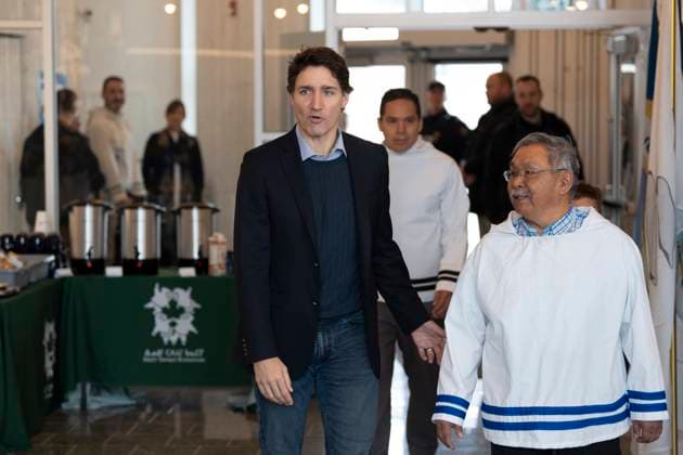May 12, 2023, Nain, NL, Canada: Prime Minister Justin Trudeau, left, Johannes Lampe, right, president of Nunatsiavut, and Natan Obed, centre back, president of the Inuit Tapiriit Kanatami, arrive for a meeting of the Inuit-Crown Partnership Committee (ICPC) in Nain, N.L. on Friday, May 12, 2023. Nain Canada  - ZUMAc35_ 20230512_zaf_c35_004 Copyright: xDarrenxCalabresex