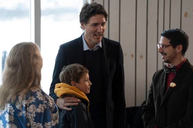 May 12, 2023, Nain, NL, Canada: Prime Minister Justin Trudeau, centre, holds his son Hadrien, 9, prior to a meeting of the Inuit-Crown Partnership Committee (ICPC) in Nain, N.L. on Friday, May 12, 2023. Nain Canada  - ZUMAc35_ 20230512_zaf_c35_006 Copyright: xDarrenxCalabresex