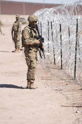 May 11, 2023, El Paso, TX, United States: Texas Army National Guard soldiers with the governors self-styled Texas Tactical Border Force, guard the border with Mexico as part of Operation Lone Star Task Force West, May 11, 2023 near El Paso, Texas. The fear over a migrant surge after Title 42 expired failed to materialize with fewer migrants risking the tougher penalties under the new Title 8 rules. El Paso United States - ZUMAp138 20230511_zaa_p138_009 Copyright: xMarkxOtte TexasxNationalx