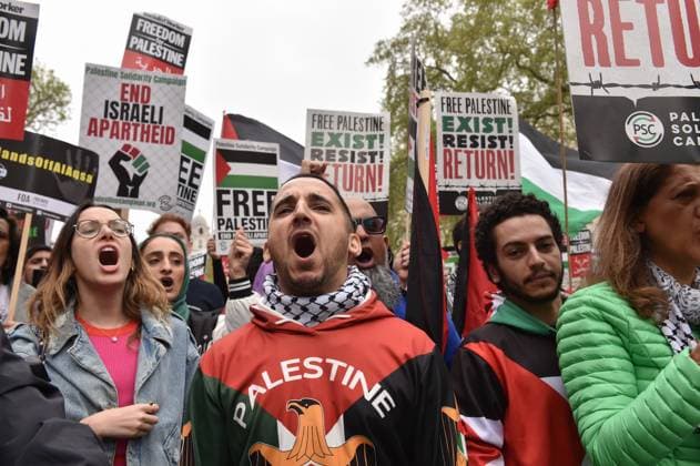May 13, 2023, London, England, United Kingdom: Demonstrator shouts slogans during the rally in central London. Palestinians commemorate the 75th anniversary of Nakba Day, also known as the Palestinian Catastrophe, which involved the destruction of Palestinian society in 1948, as well as the continuing displacement of many Palestinian people from their homeland. London United Kingdom - ZUMAk172 20230513_zip_k172_033 Copyright: xThomasxKrychx