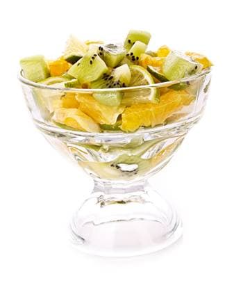 Cup with orange, kiwi and lime isolated on white Copyright: xLeonidxYastremskiyx xDesignxPicsx , 31033281 Copyright: LeonidxYastremskiyx xDesignxPics 31033281