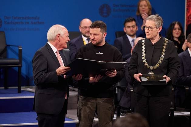 Ukrainian President Volodymyr Zelensky receives the Charlemagne Prize for Services to European Unity from the Lord Mayor of Aachen Sibylle Keupen (R) on May 14, 2023 in the Coronation Hall in Aachen, Germany. The President of Ukraine Volodymyr Zelensky and the people of his country are awarded the International Charlemagne Prize in Aachen on Sunday, May 14..  GRM2023051443