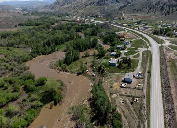 May 14, 2023, CACHE CREEK, BC, CANADA: The swollen Bonaparte River runs through the Bonaparte First Nation north of Cache Creek, B.C., on Sunday, May 14, 2023. Environment Canada says unseasonably hot temperatures in British Columbia will persist over the coming days, with special weather statements warning of high river streamflows due to melting snow in hard-hit communities in the province s interior. CACHE CREEK CANADA  - ZUMAc35_ 20230514_zaf_c35_112 Copyright: xDarrylxDyckx