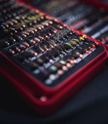 A close-up photo of a box of artificial flies used for fly fishing Colebrook, New Hampshire, United States CR_BRDO230211C-1125370-01