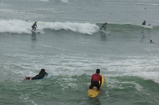 RECORD DATE NOT STATED The surfers enjoying ocean waves in Lima, Peru *** der Wellenreiter genießend Ozean Wellen ÊIn Lima, Perus 6443492