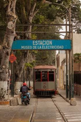 RECORD DATE NOT STATED A vertucal shot of the street in the Barranco neighbourhood of Lima, Peru with a tram and a biker *** einer vertucal erschossen des der Straße ÊIn der Barranco Kiez des Lima, Perus mit einer Straßenbahn und einer biker 6443496