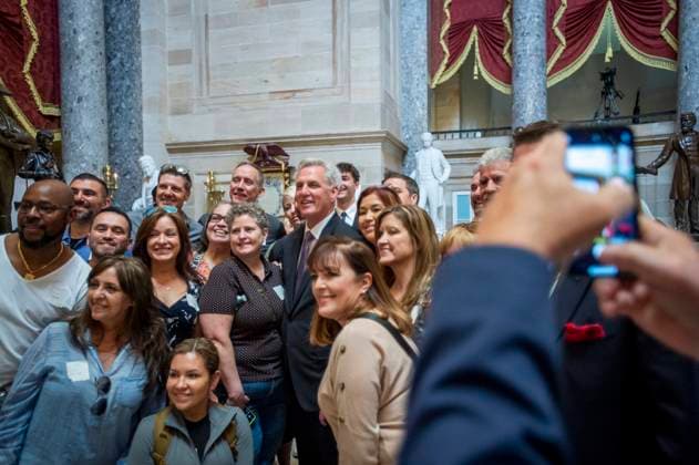 May 17, 2023, Washington, District of Columbia, USA: Speaker of the United States House of Representatives Kevin McCarthy (Republican of California) stops to pose with visitors in Statuary Hall at the US Capitol after departing the House chamber in Washington, DC, Wednesday, May 17, 2023 Washington USA - ZUMAs152 20230517_zaa_s152_079 Copyright: xRodxLamkeyx