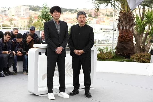 May 18, 2023, Cannes, Cote d Azur, France: SAKAMOTO YUJI and HIROKAZU KORE-EDA attend the photocall for Kaibutsu during the 76th Annual Cannes Film Festival at Palais des Festivals on May 18, 2023 in Cannes, France Cannes France - ZUMAc179 20230518_zep_c179_113 Copyright: xMickaelxChavetx