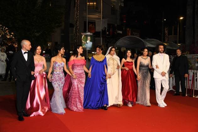 76th Cannes Film Festival 2023, Red Carpet Film Four Daughters. Pictured Nour Karoui, Ichraq Matar, Hend Sabri, Director Kaouther Ben Hania, Olfa Hamrouni, Tayssir Chikhaoui, Tayssir Chikhaoui and Producer Nadim Cheikhrouha  Copyright: xManuelexMangiarottix xipa-agencyx xPoolxPhotoxEventsx01x IPA_IPA38060209