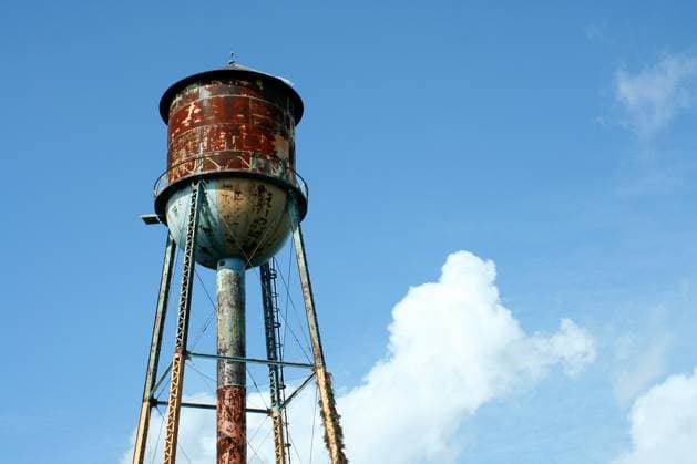 A Old rusty watertower against blue sky Copyright: xJimxMillsx xDesignxPicsx , 31280327 Copyright: VladislavxAgeshinx xDesignxPics 31280327