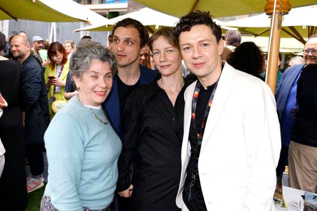Kirsten Niehuus, Franz Rogowski, Sandra Hüller und Christian Friedel beim German Films und Medienboard Empfang 2023 im Garten des Hotels Mondrian Cannes auf dem Festival de Cannes 2023 76. Internationale Filmfestspiele von Cannes am Palais des Festivals. Cannes, 20.05.2023