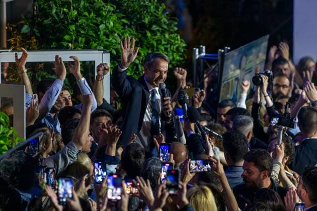 News Themen der Woche KW20 News Bilder des Tages (230522) -- ATHENS, May 22, 2023 -- Greek Prime Minister and New Democracy (ND) party leader Kyriakos Mitsotakis (C) celebrates with supporters at the political party s headquarters in Athens, Greece, on May 21, 2023. Greek conservatives received a clear mandate from Greek people to continue efforts to change the country with a strong government, Prime Minister Kyriakos Mitsotakis said on Sunday after his ND party won the general elections by a huge margin. ND garnered 40.79 percent of the votes, securing 145 seats in the next 300-member parliament, according to 96.03 percent of the votes counted, official results released by the Interior Ministry showed. TO GO WITH Roundup: Greek conservatives win general elections, fall short of maj 