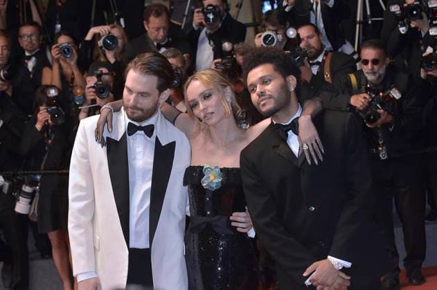 Sam Levinson, Lily-Rose Depp and Abel The Weeknd Tesfaye arrive at the The Idol red carpet during the 76th annual Cannes film festival at Palais des Festivals on May 22, 2023 in Cannes, France.  CAP20230522814 RoccoxSpaziani