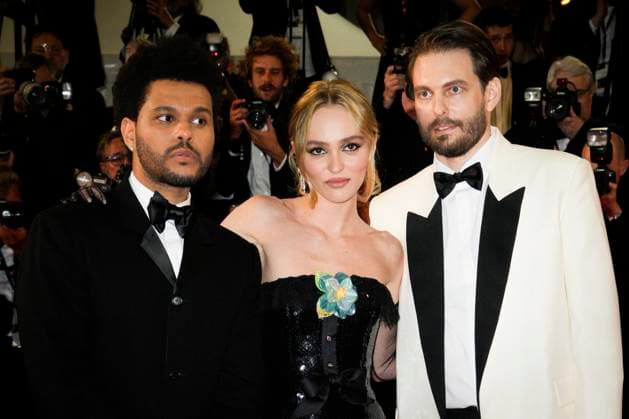 Foto IPP Daniele Cifala™ Cannes 22 05 2023 The Idol Red Carpet - The 76th Annual Cannes Film Festival nella foto : Canadian singer Abel Makkonen Tesfaye aka The Weeknd, French-US actress Lily-Rose Depp and US director Sam Levinson Italy Photo Press - World Copyright