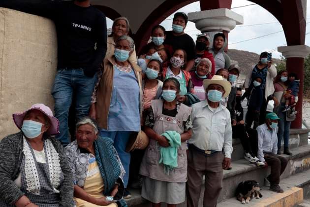 May 22, 2023, Santiago Xalitzintla, Puebla: Inhabitants after a meeting with government authorities wear face masks due to the fall of ash emitted by the Popocatepetl volcano in the municipality of Santiago Xalitzintla in the state of Puebla. on May 22, 2023 in Santiago Xalitzintla, Puebla Municipality of Santiago Xalitzi Mexico - ZUMAe321 20230523_zia_e321_005 Copyright: xLuisxBarronx