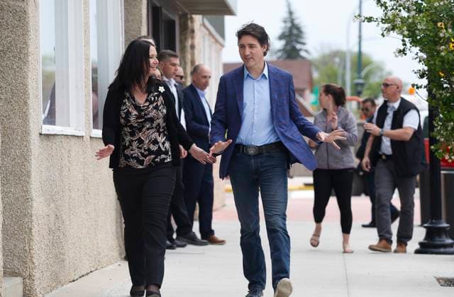 May 24, 2023, WINNIPEG, MANITOBA, CANADA: Prime Minister Justin Trudeau goes for lunch with by-election candidate Kerry Smith after meeting with supporters at a rally in Portage La Prairie, Man. Wednesday, May 24, 2023. WINNIPEG CANADA  - ZUMAc35_ 20230524_zaf_c35_097 Copyright: xJohnxWoodsx