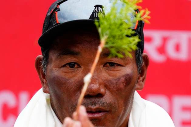 May 25, 2023, Kathmandu, Nepal: Nepalese veteran mountaineer Kami Rita Sherpa, 53, who broke his own world record after climbing the world s highest peak Mount Everest for the 28th time, takes part in prayers upon his arrival at Kathmandu airport in Nepal on Thursday, May 25, 2023. Kathmandu Nepal - ZUMAg200 20230525_zap_g200_007 Copyright: xSkandaxGautamx